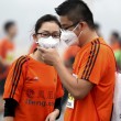 Maratona Pechino: gli atleti corrono con le mascherine, colpa dello smog01