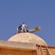 Isis, crocifissi e Madonne abbattute: al loro posto la bandiera nera FOTO