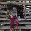 Cina, 16enne autistica incatenata per 5 anni in una gabbia di legno4