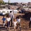 Festa al campo rom: non lo invitano, li prende a bastonate
