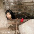 Cina, donna malata di mente vive in gabbia nello scantinato FOTO4