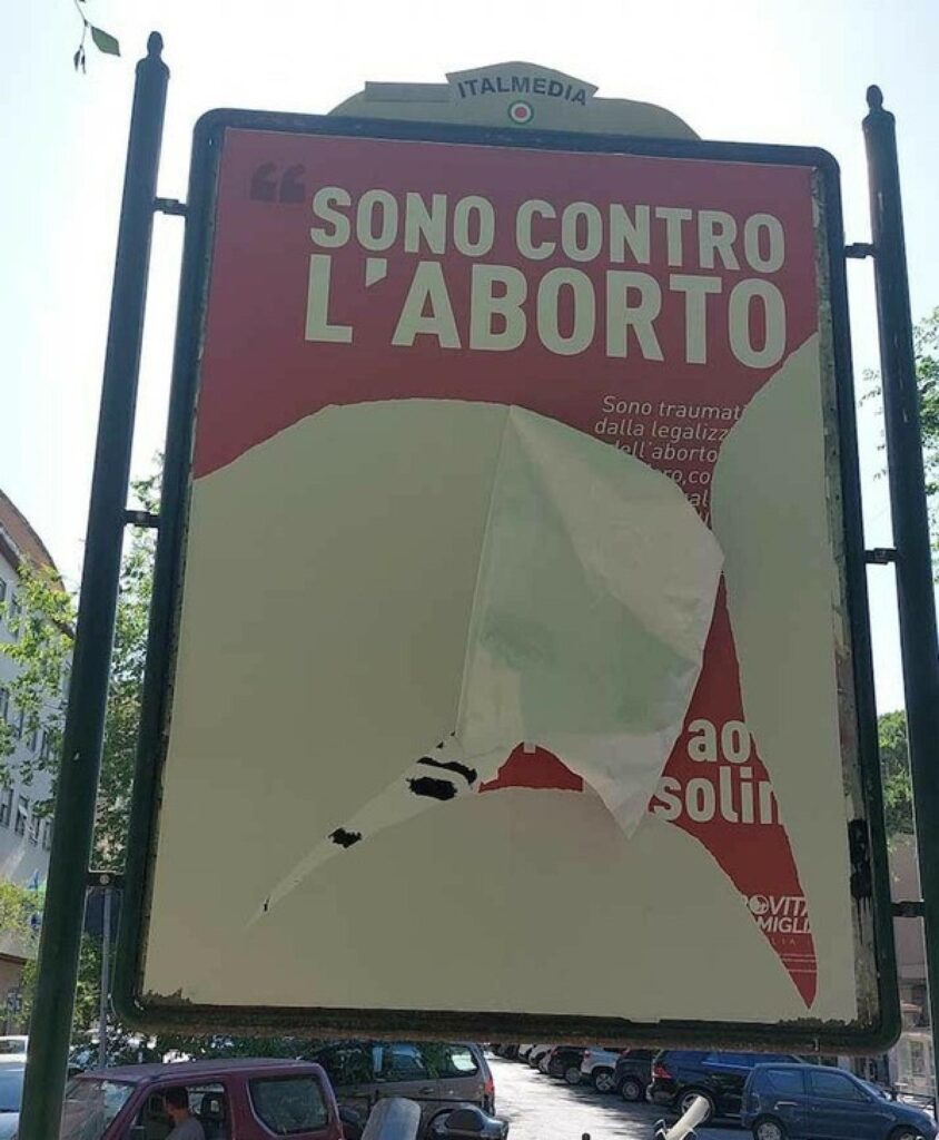Il manifesto contro l'aborto strappato a Roma (Ansa)